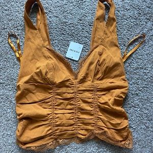 Free people gold tank top